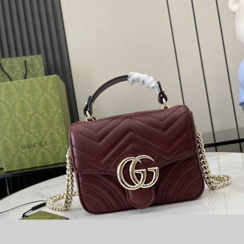 G*u*i top handle bags